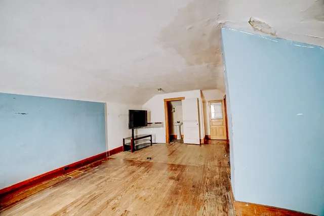 a view of a backyard with a small cabin