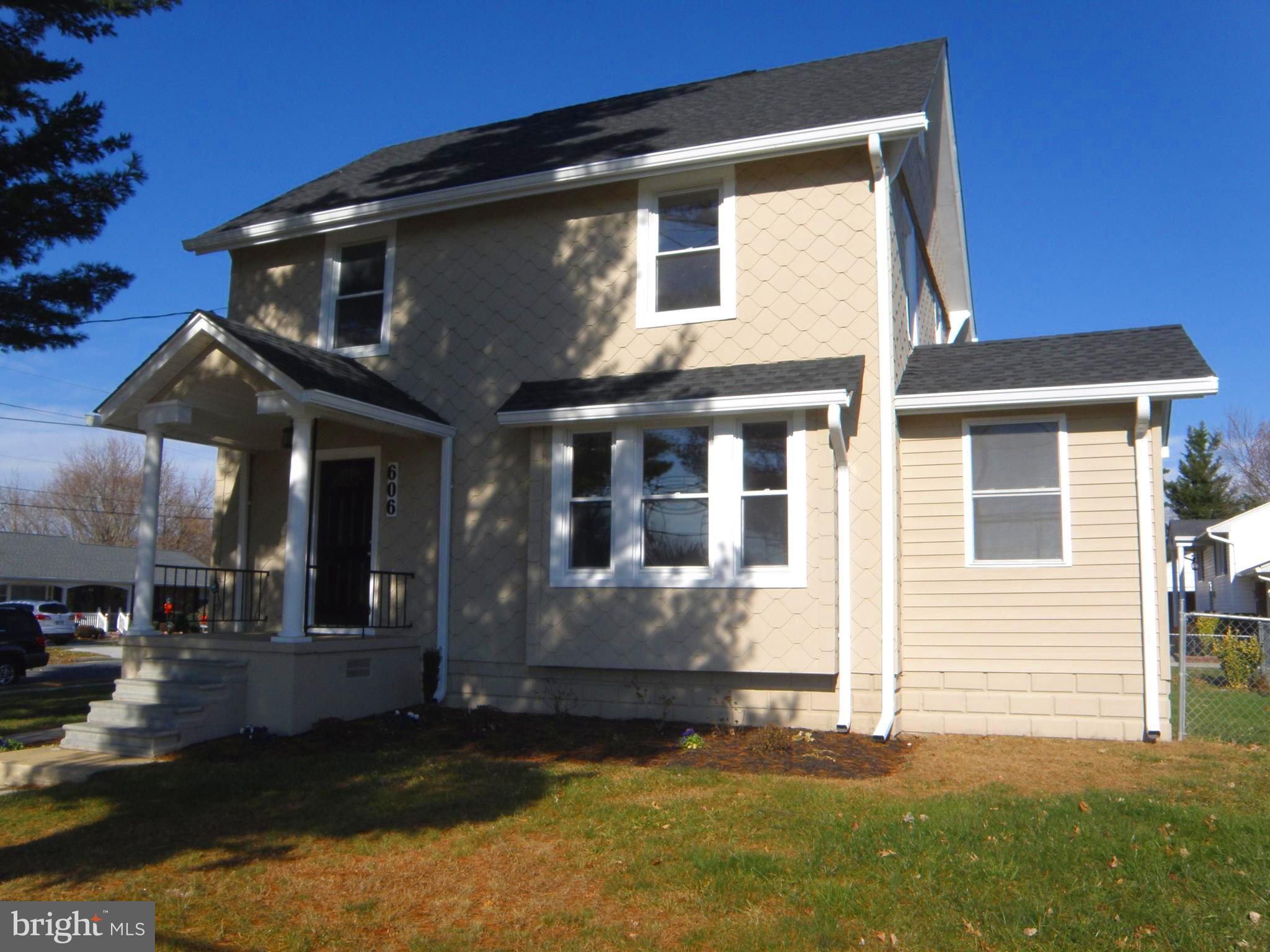 606 Andover Road Linthicum, MD 21090 - Photo 2 of 29 a front view of a house with a yard