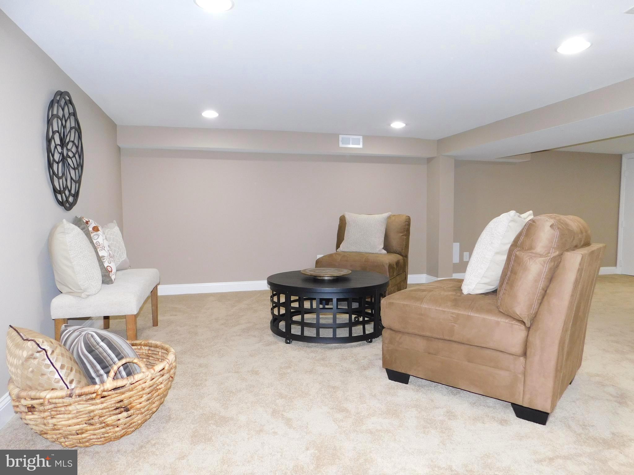 606 Andover Road Linthicum, MD 21090 - Photo 22 of 29 a living room with furniture and a couch