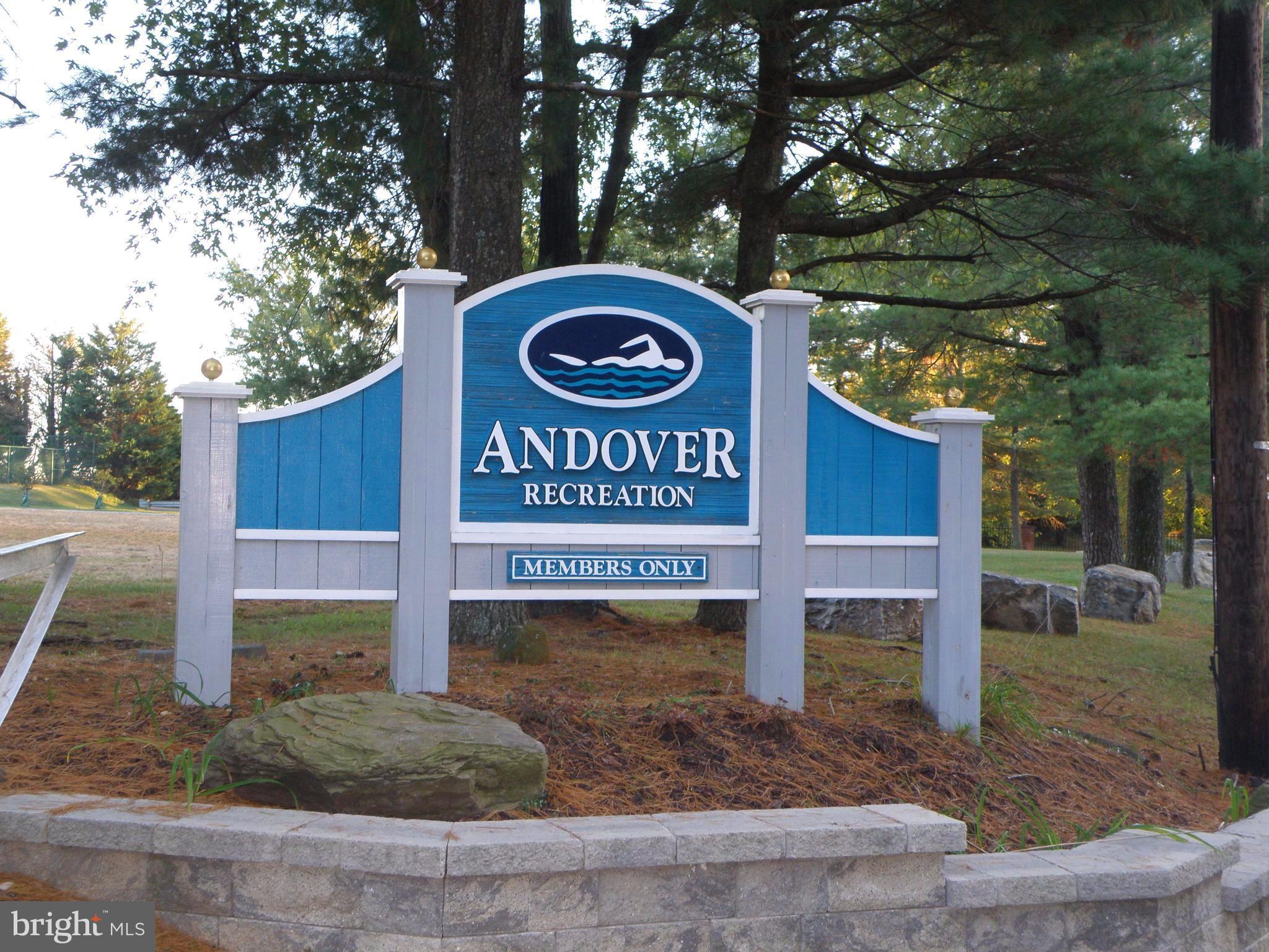 606 Andover Road Linthicum, MD 21090 - Photo 26 of 29 a view of a street sign under a large tree