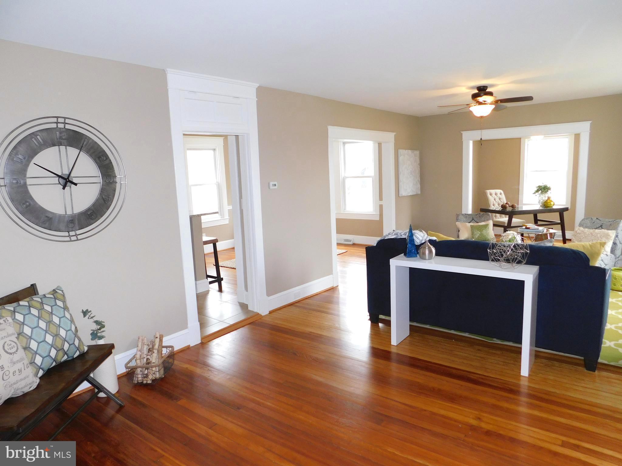 606 Andover Road Linthicum, MD 21090 - Photo 5 of 29 a view of living room with furniture and wooden floor
