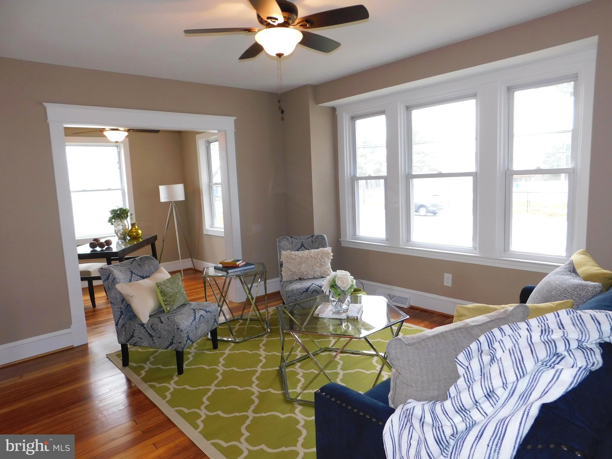 606 Andover Road Linthicum, MD 21090 - Photo 6 of 29 a view of a dining room with furniture window and wooden floor