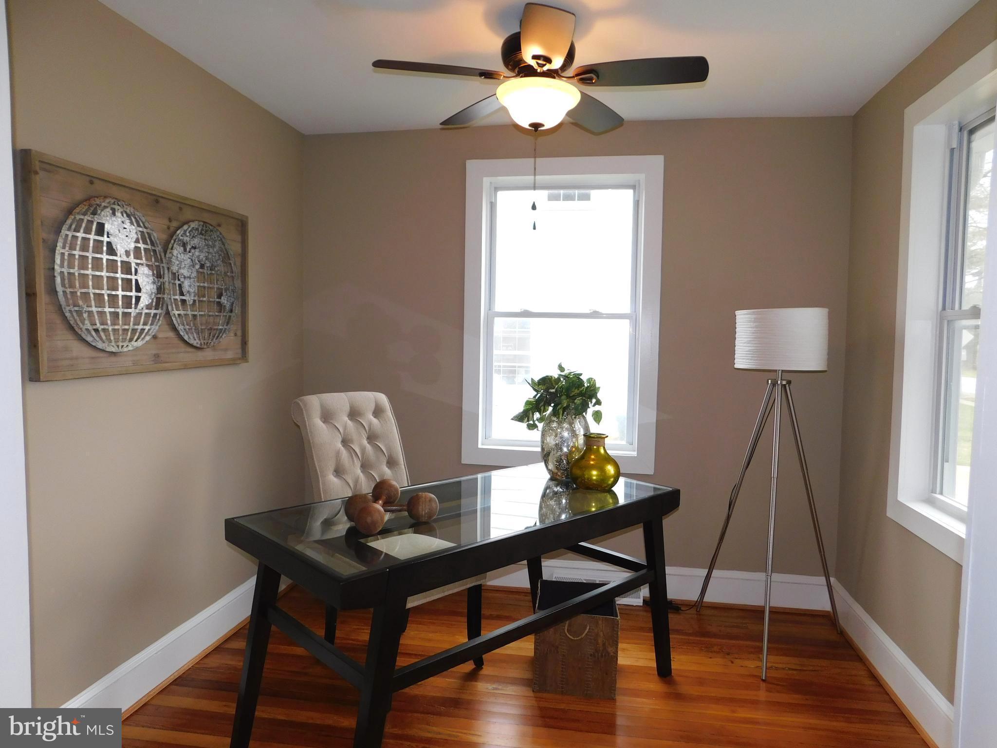 606 Andover Road Linthicum, MD 21090 - Photo 7 of 29 a view of a workspace with furniture and a window