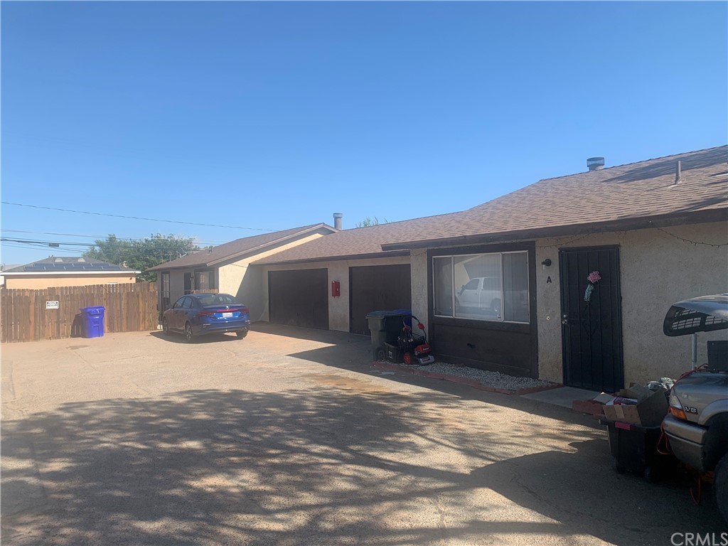 15777 Wanaque Road Apple Valley, CA 92307 - Photo 1 of 1 a view of a house with a patio