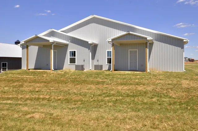 a view of a house with a swimming pool