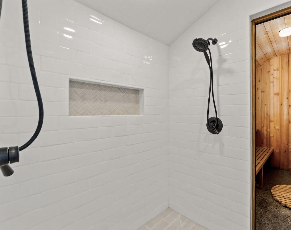 60359 Arnold Market Road Bend, OR 97702 - Photo 32 of 64 full-tile shower room adjacent to sauna and hallway bath