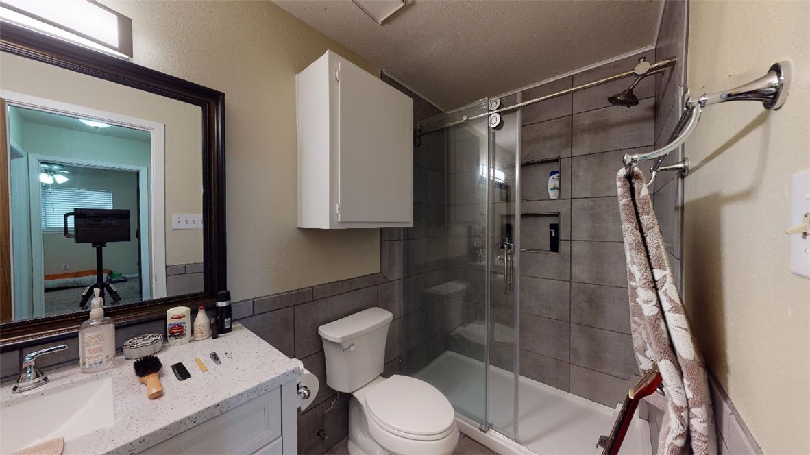 1809 Treehouse Trail, Unit D College Station, TX 77845 - Photo 14 of 23 a bathroom with a sink toilet and shower