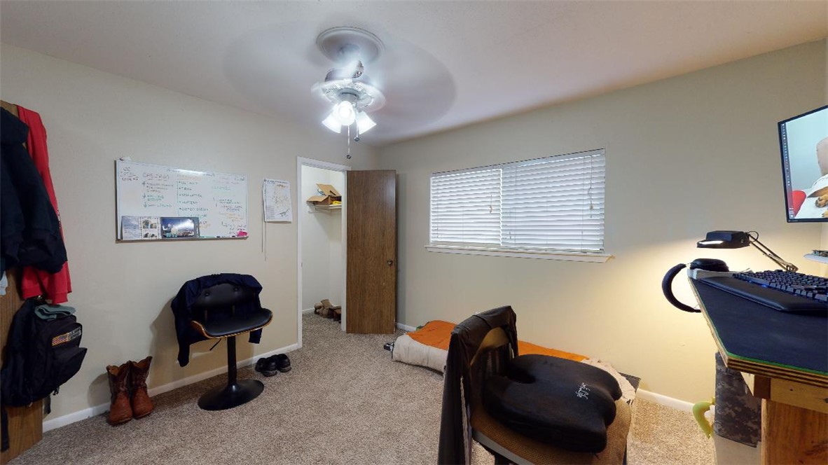 1809 Treehouse Trail, Unit D College Station, TX 77845 - Photo 21 of 23 a livingroom with window and workspace