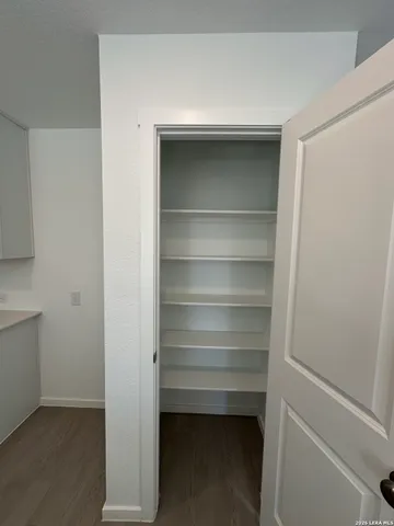 a storage room with washer and dryer