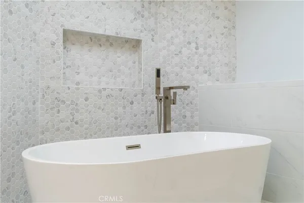 a bathroom with a bathtub