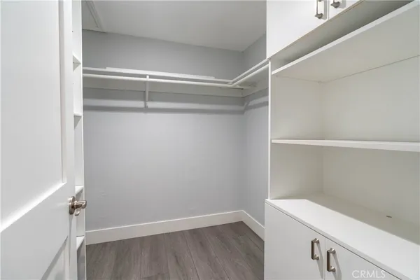 a view of an empty walk in closet