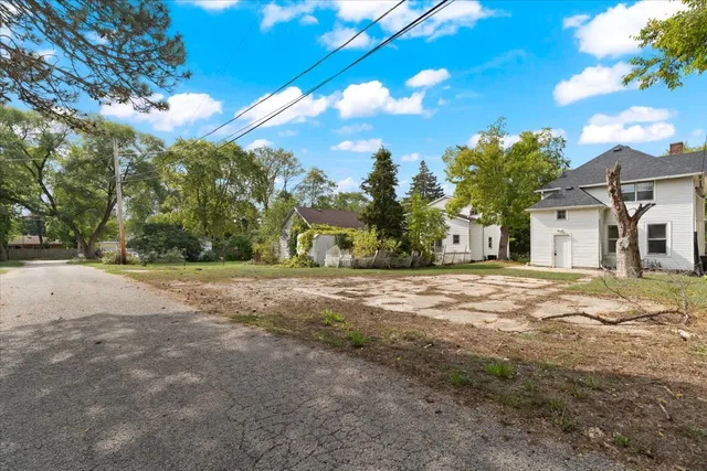 a view of road and trees