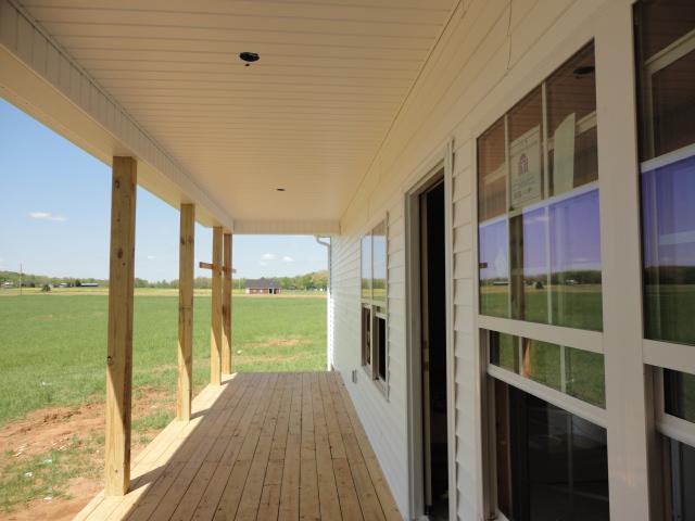 8 Williams Road Manchester, TN 37355 - Photo 4 of 15 a view of a balcony with floor to ceiling windows with wooden floor