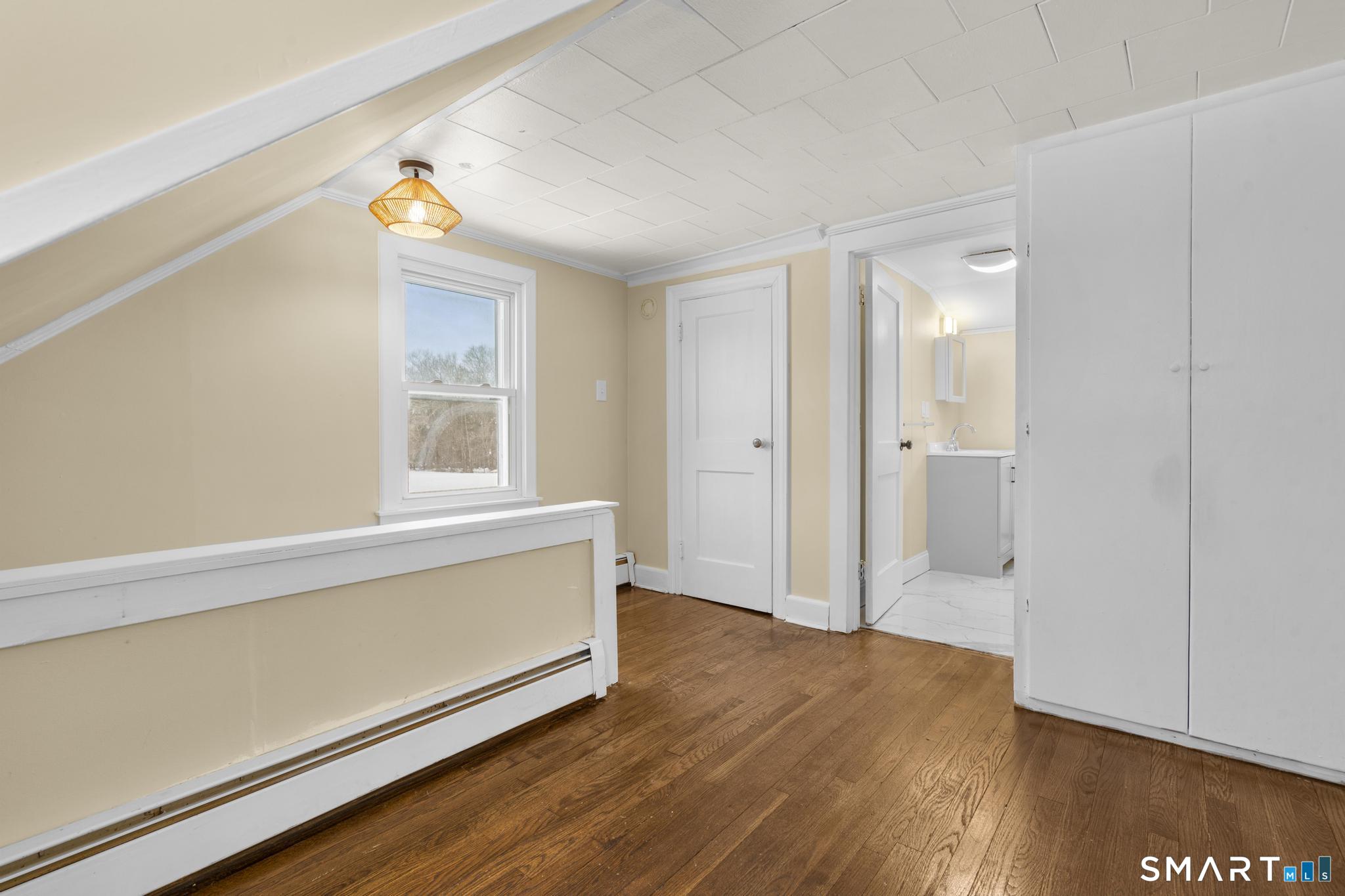 165 Ballamahack Road Windham, CT 06280 - Photo 24 of 40 a view of an empty room and window