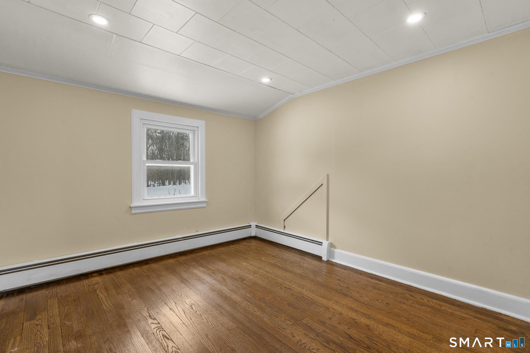 165 Ballamahack Road Windham, CT 06280 - Photo 34 of 40 an empty room with a window