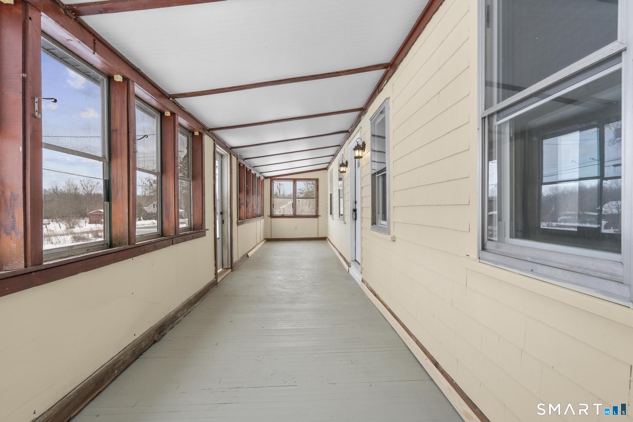 165 Ballamahack Road Windham, CT 06280 - Photo 36 of 40 a view of a building with a large window