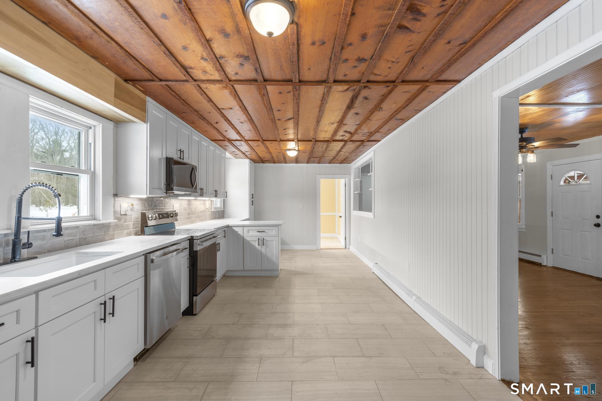 165 Ballamahack Road Windham, CT 06280 - Photo 9 of 40 a large kitchen with a large window