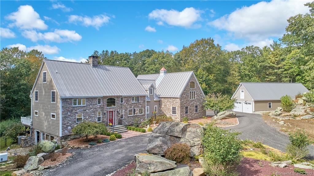 497 Toby Hill Road Westbrook, CT 06498 - Photo 1 of 1 a front view of a house with garden