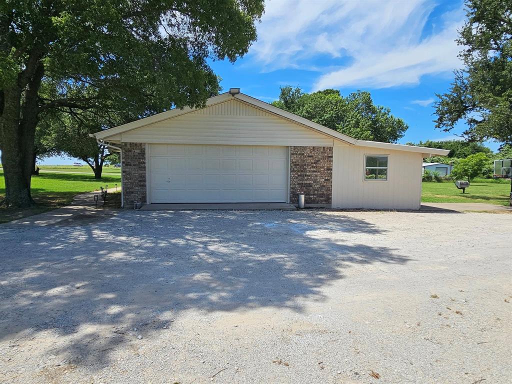 4170 Farm To Market 51 Decatur, TX 76234 - Photo 31 of 34 a view of a house with a yard and large tree