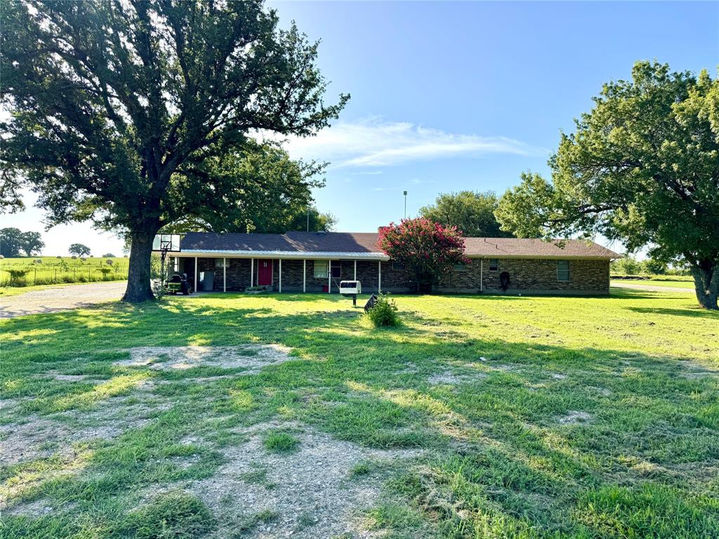 4170 Farm To Market 51 Decatur, TX 76234 - Photo 33 of 34 a front view of a house with garden