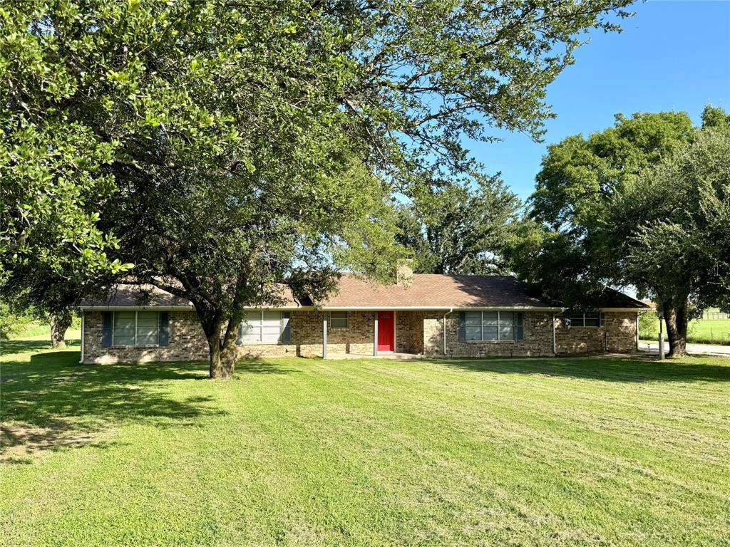 4170 Farm To Market 51 Decatur, TX 76234 - Photo 5 of 34 a front view of a house with a yard