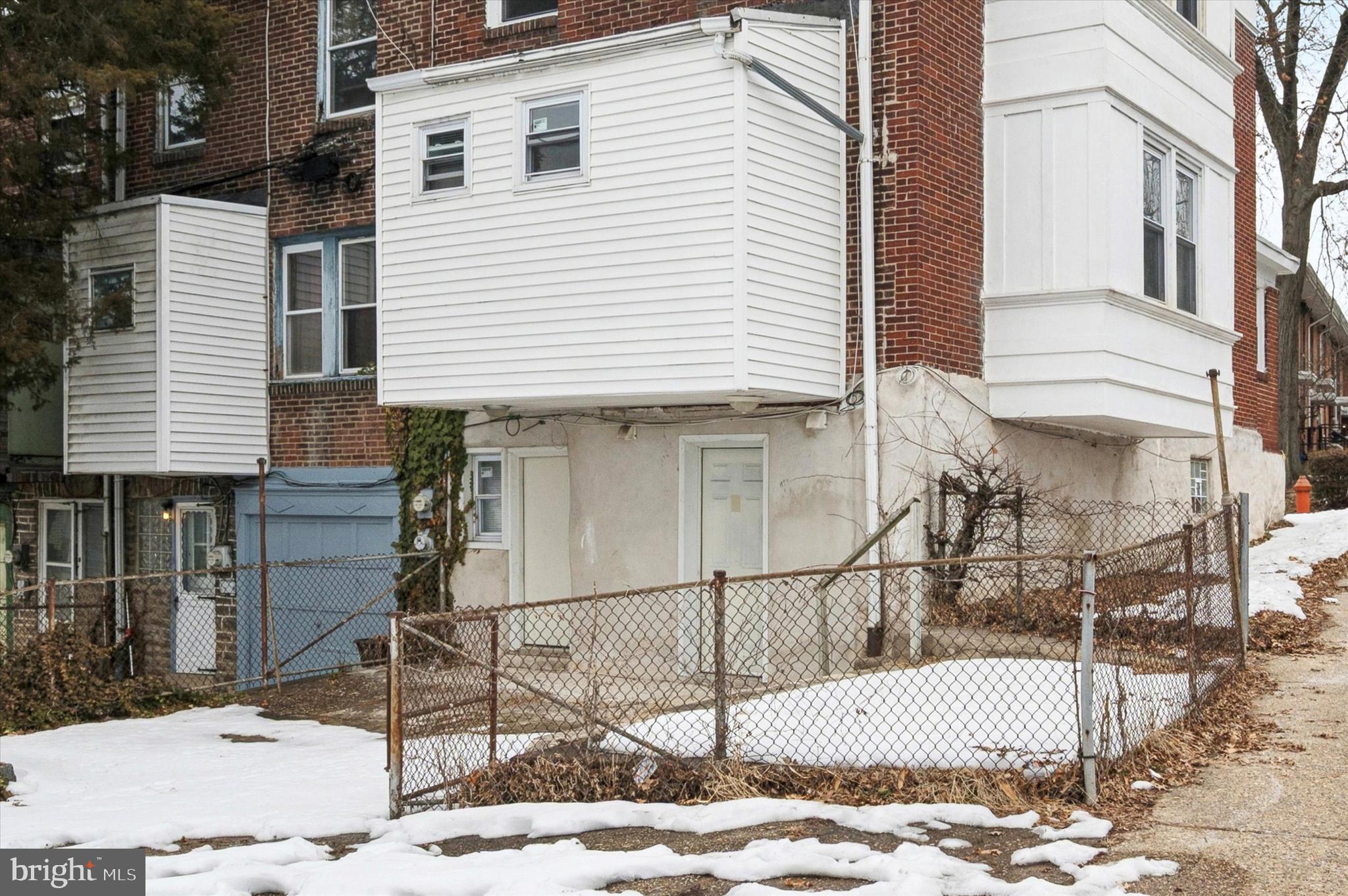 2000 Widener Place, Unit 1 Philadelphia, PA 19138 - Photo 14 of 15 a view of a house with a small yard