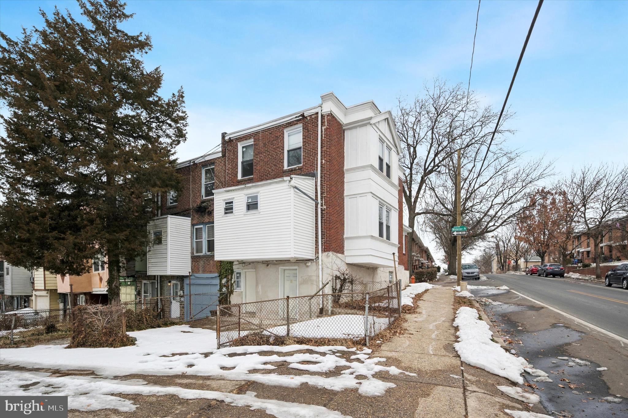2000 Widener Place, Unit 1 Philadelphia, PA 19138 - Photo 15 of 15 a street view with residential house