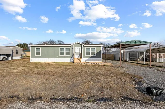 a house view with a garden space