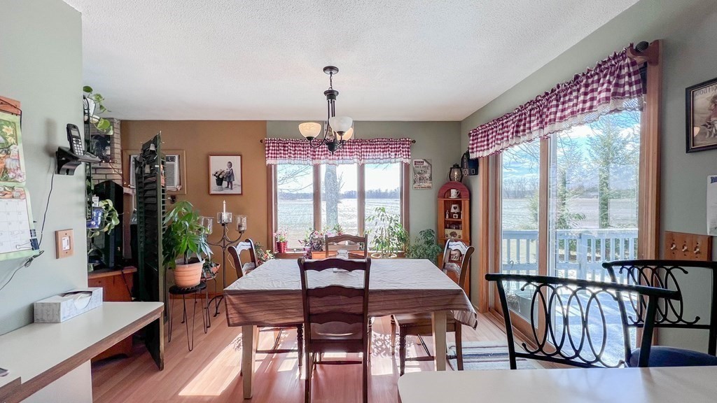 313 Hadley Road Sunderland, MA 01375 - Photo 8 of 40 a view of a dining room with furniture window and outside view