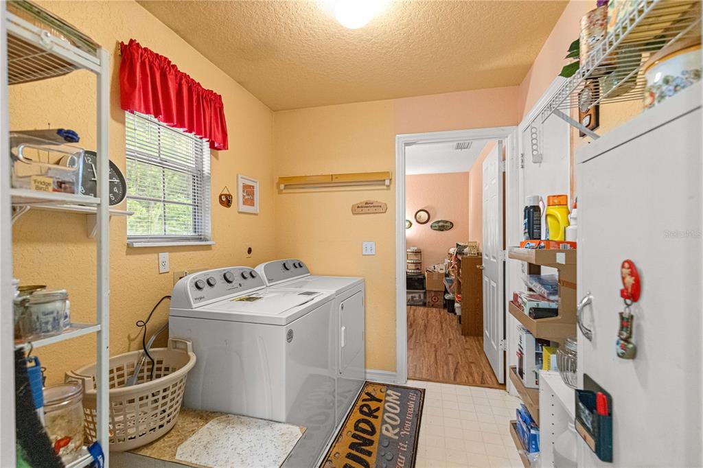 8534 Southwest 108th Pl Road Ocala, FL 34481 - Photo 13 of 41 a room with storage and utility