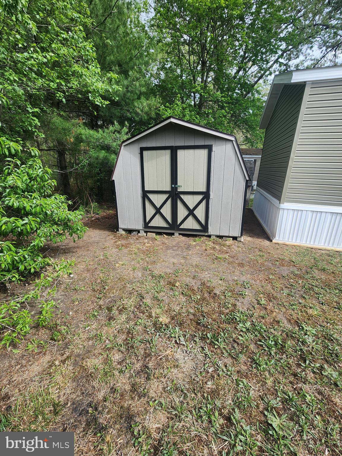 2110 Mays Landing Road, Unit 161 Millville, NJ 08332 - Photo 4 of 12 a view of a house with a yard and sitting area
