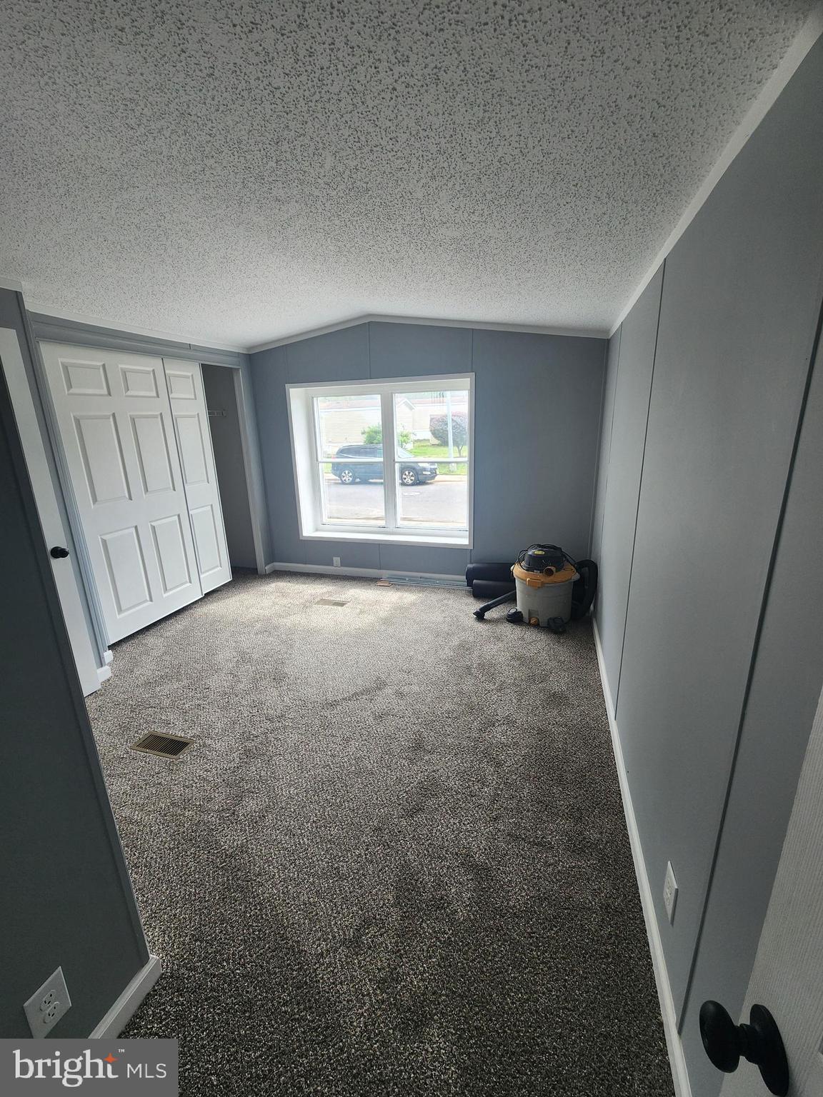 2110 Mays Landing Road, Unit 161 Millville, NJ 08332 - Photo 10 of 12 a view of empty room with front door