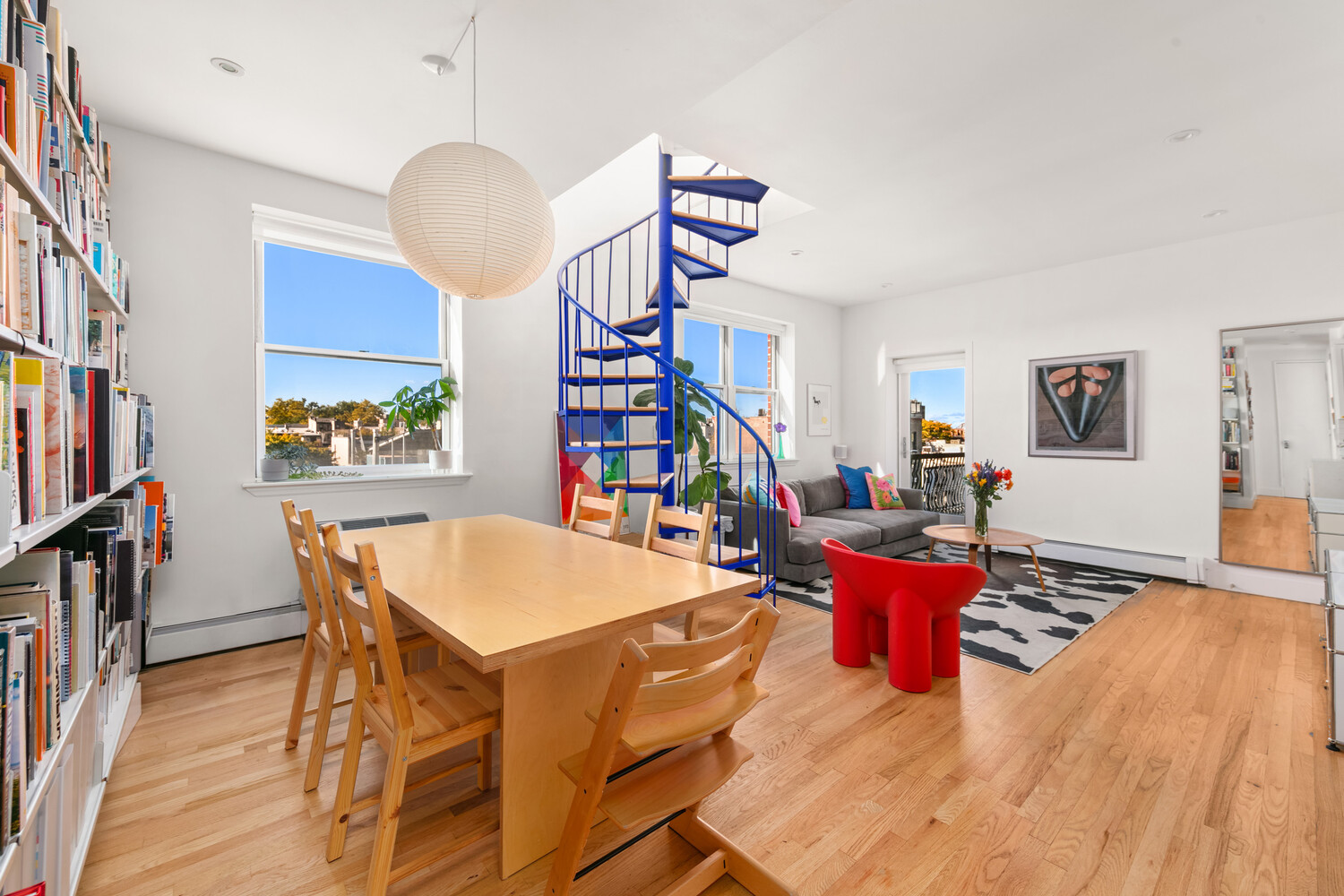 344 Degraw Street, Unit PHA Brooklyn, NY 11231 - Photo 3 of 14 a living room with furniture and a wooden floor