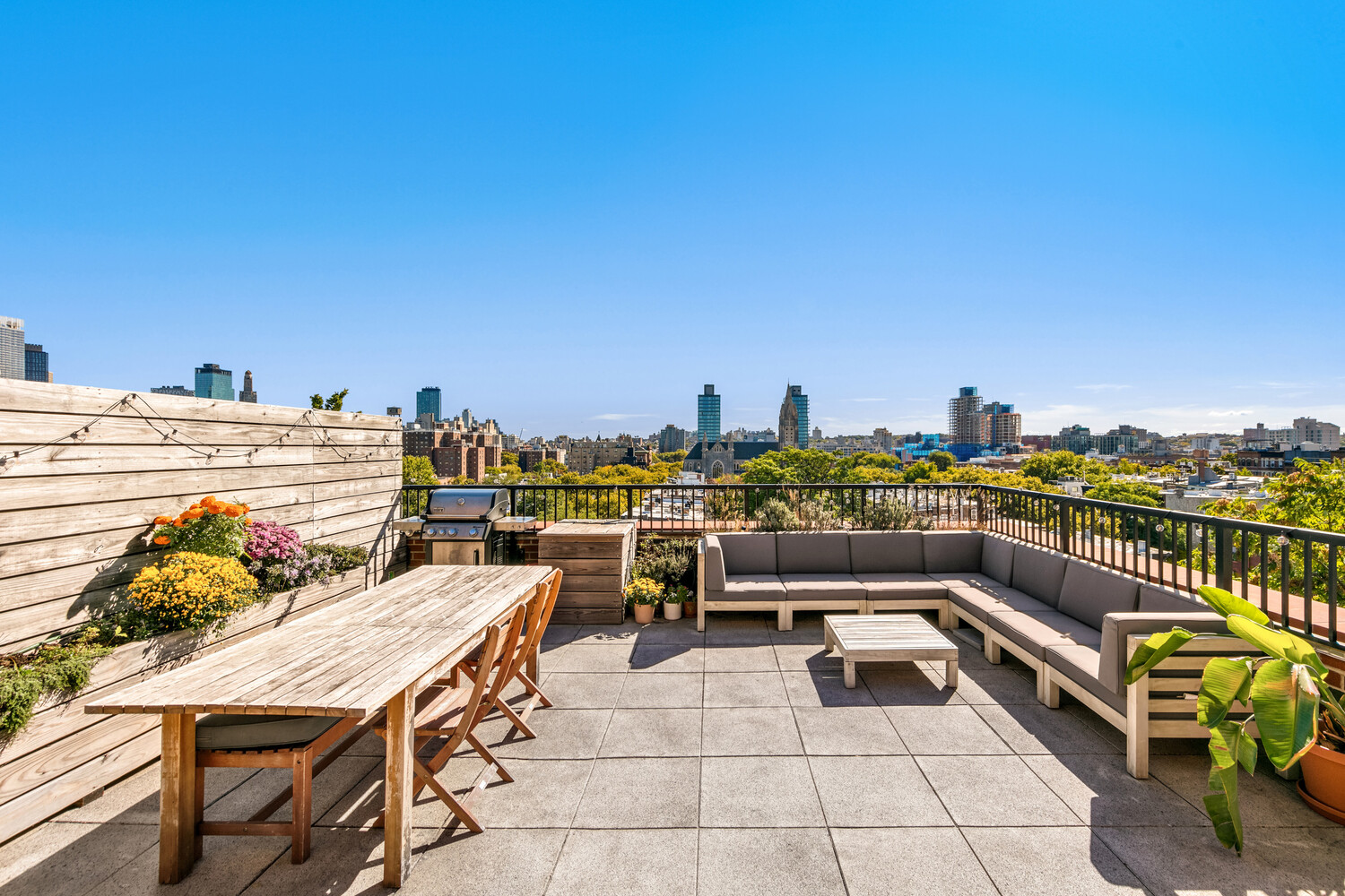 344 Degraw Street, Unit PHA Brooklyn, NY 11231 - Photo 6 of 14 a terrace with outdoor seating and city view
