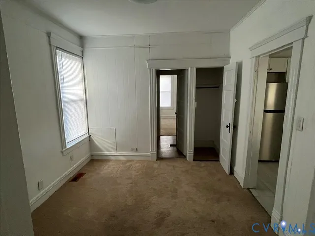 an empty room with windows