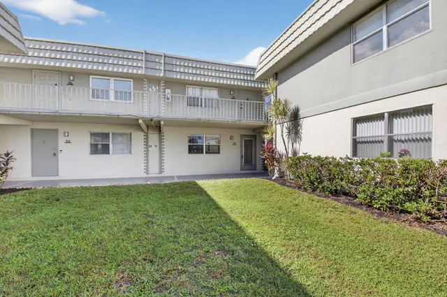 a view of a back yard of the house