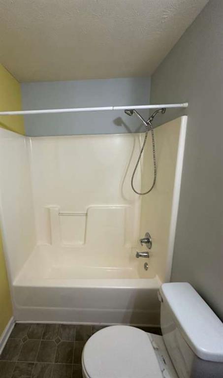 5103 Jack Drive Decatur, GA 30035 - Photo 20 of 34 a bathroom with a toilet and a shower
