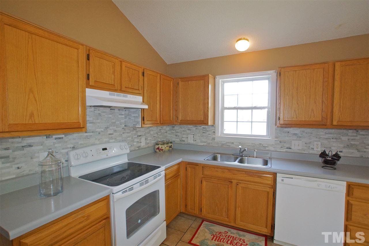 Beautiful tile back splash and tile floors