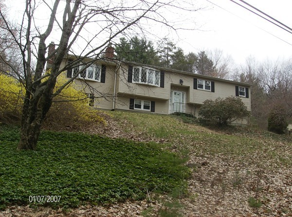 102 West Millbury Road Sutton, MA 01590 - Photo 1 of 24 a view of a yard in front of house