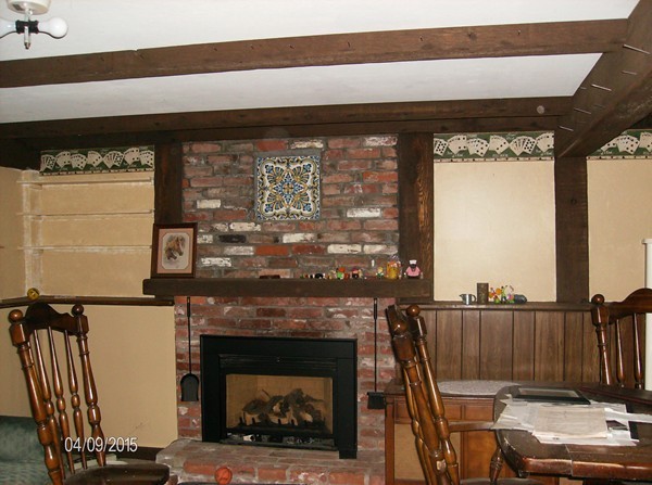 102 West Millbury Road Sutton, MA 01590 - Photo 16 of 24 a living room with furniture and a fireplace