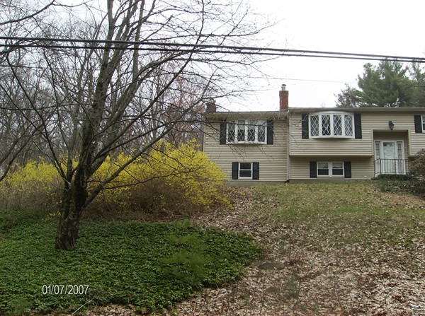 102 West Millbury Road Sutton, MA 01590 - Photo 24 of 24 a view of a house with a yard