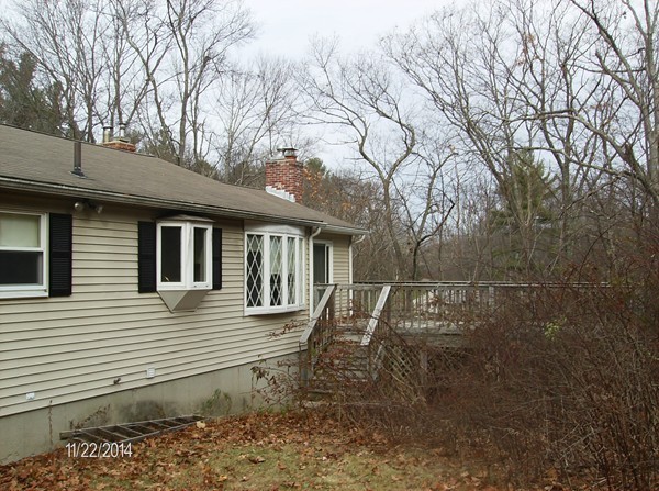 102 West Millbury Road Sutton, MA 01590 - Photo 8 of 24 a view of a house with a yard