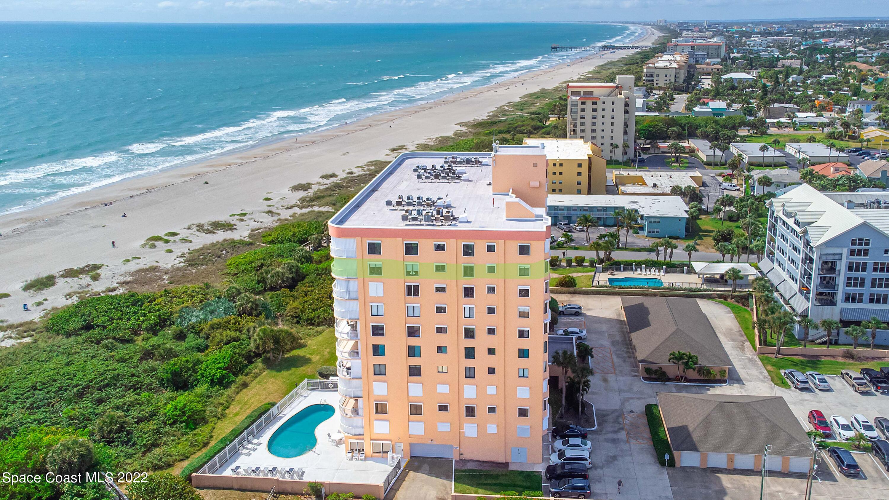 6770 Ridgewood Avenue, Unit 1001 Cocoa Beach, FL 32931 - Photo 3 of 57 a view of a city with an ocean view