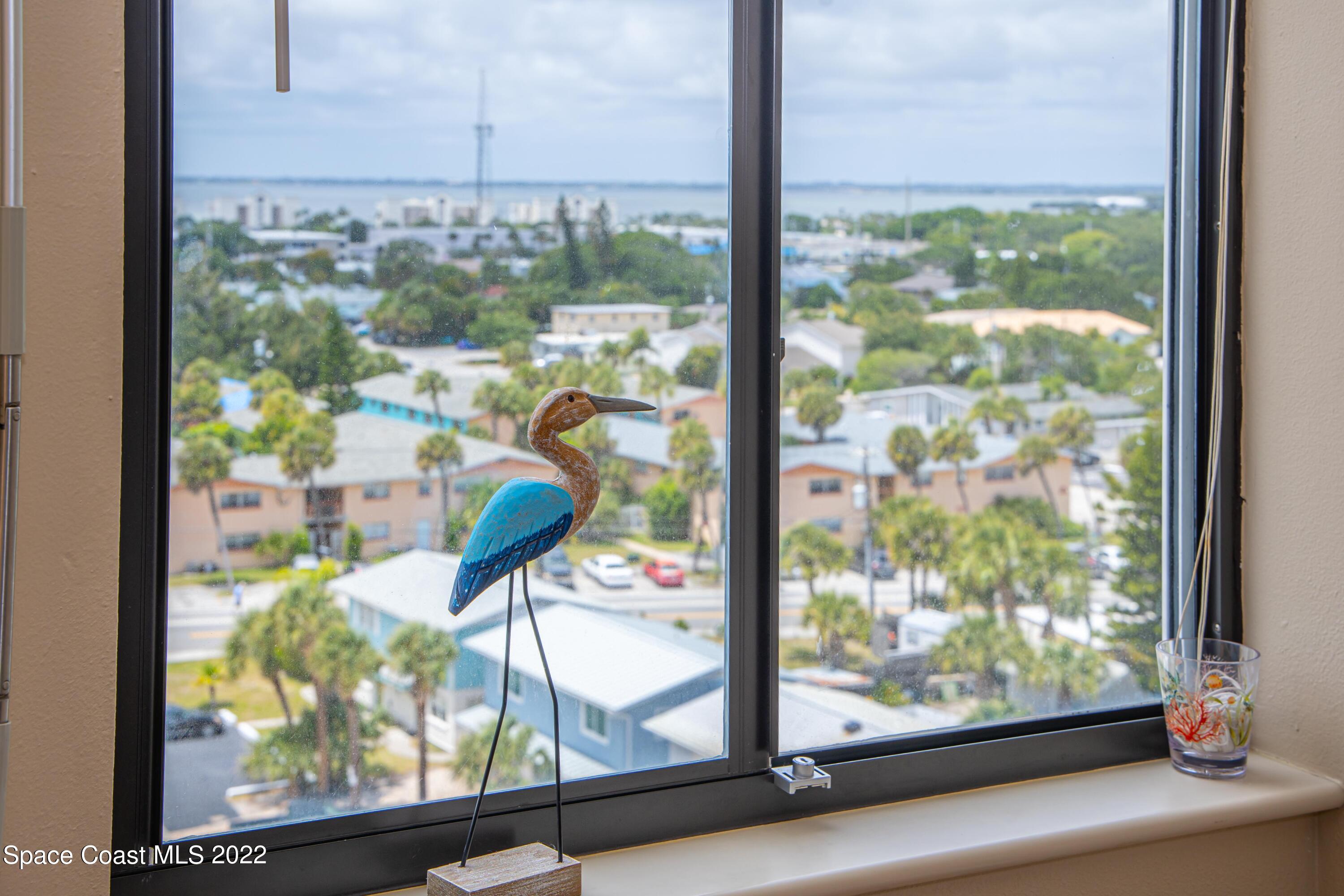 6770 Ridgewood Avenue, Unit 1001 Cocoa Beach, FL 32931 - Photo 35 of 57 a view of a city from a window