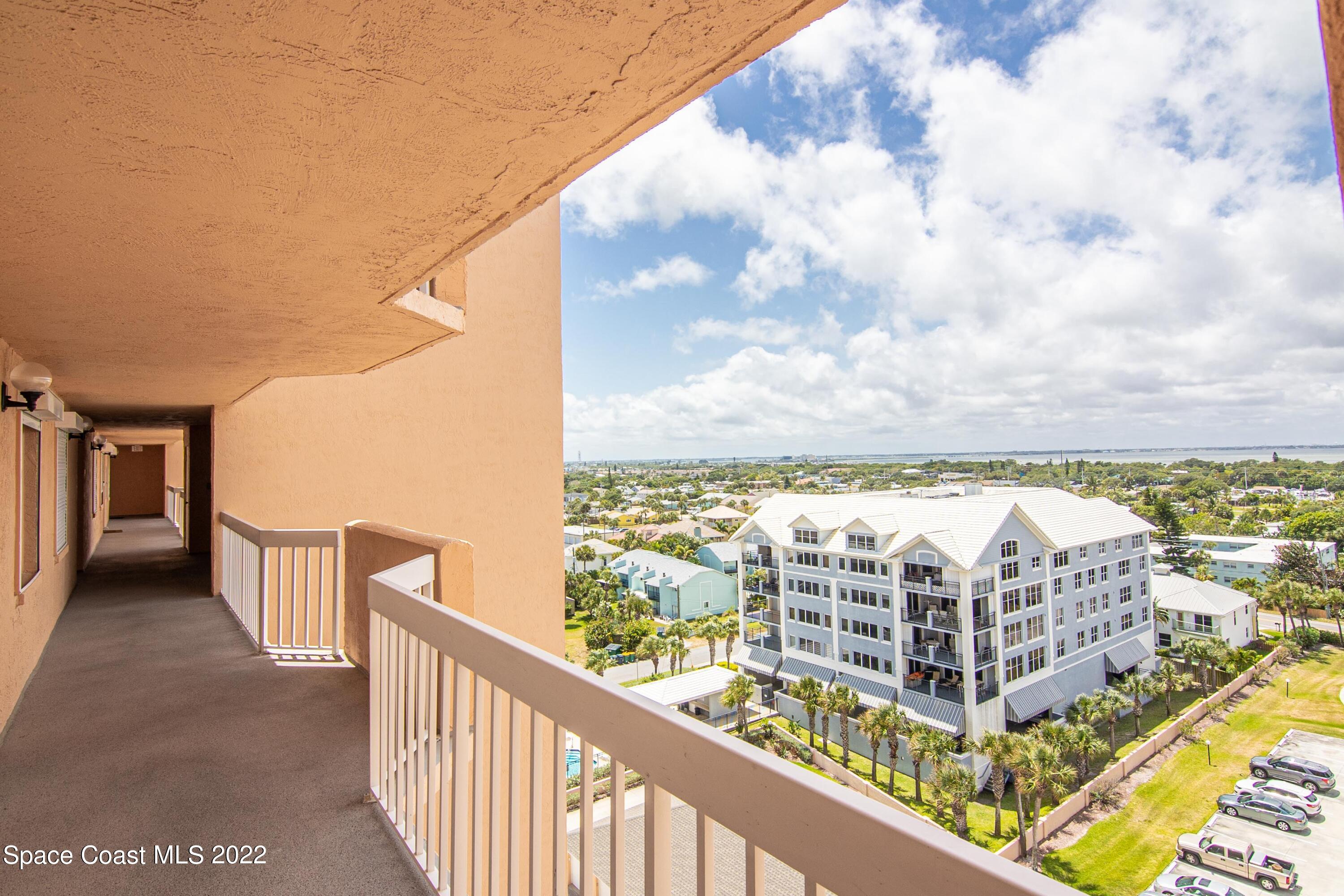 6770 Ridgewood Avenue, Unit 1001 Cocoa Beach, FL 32931 - Photo 40 of 57 a view of a balcony with city view