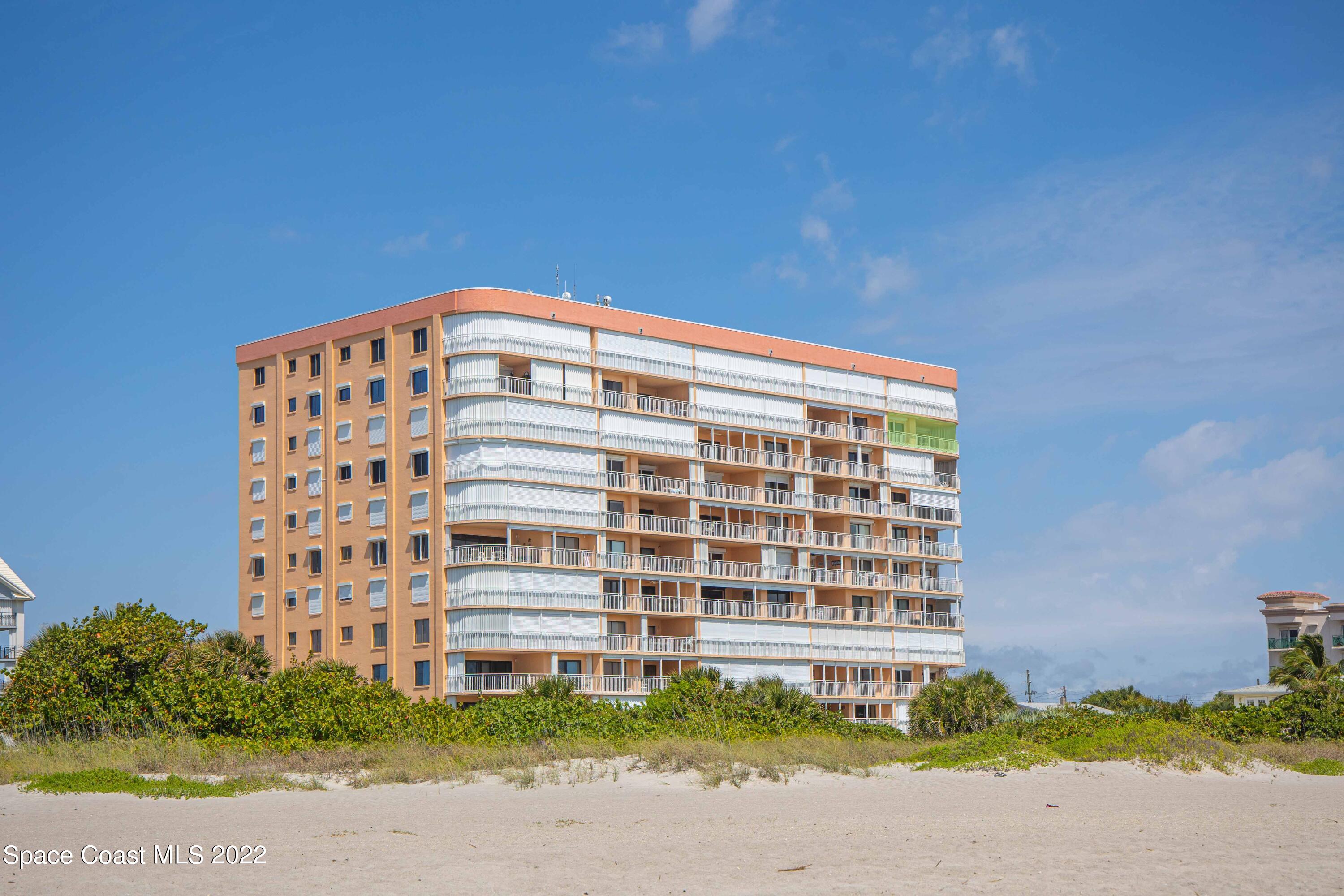 6770 Ridgewood Avenue, Unit 1001 Cocoa Beach, FL 32931 - Photo 50 of 57 a front view of a building