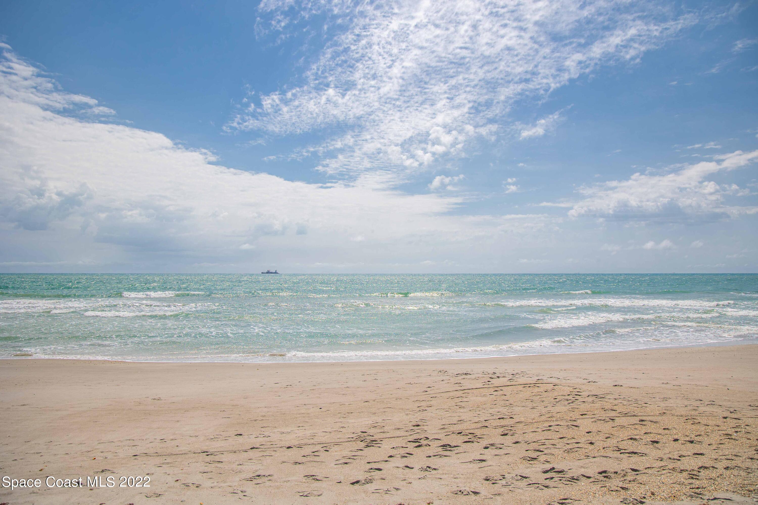 6770 Ridgewood Avenue, Unit 1001 Cocoa Beach, FL 32931 - Photo 53 of 57 a view of beach and ocean
