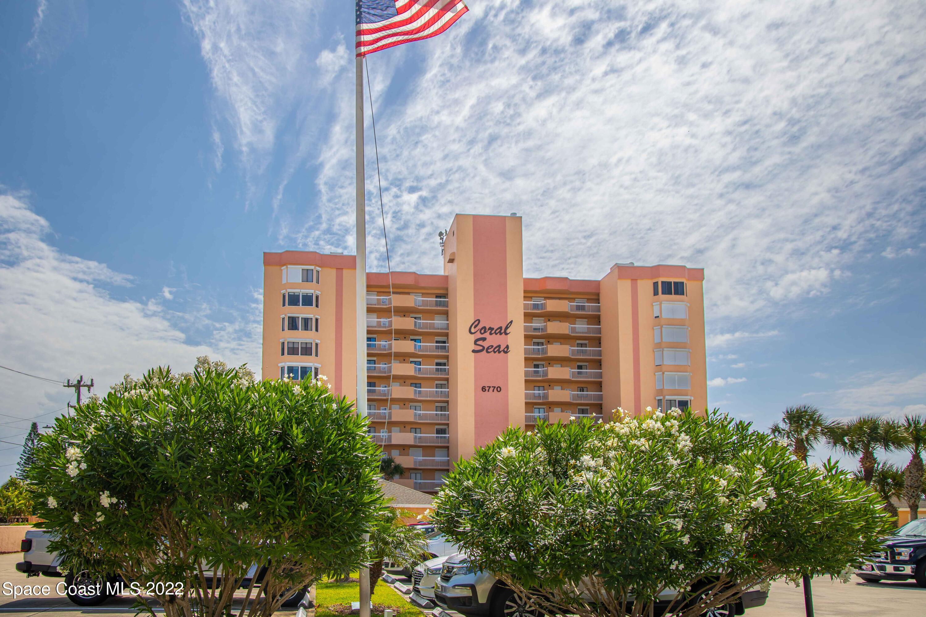 6770 Ridgewood Avenue, Unit 1001 Cocoa Beach, FL 32931 - Photo 57 of 57 a view of a city with tall buildings