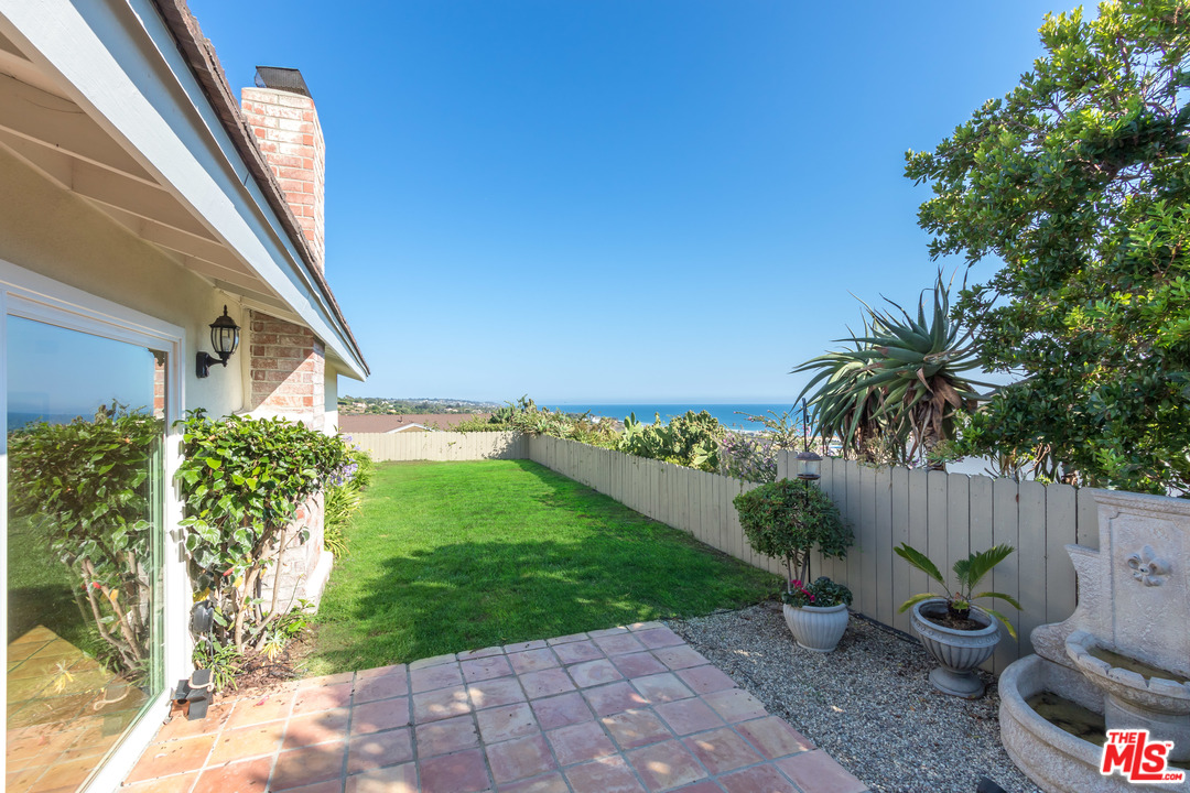 6267 Tapia Drive Malibu, CA 90265 - Photo 15 of 16 a view of a backyard with plants and outdoor seating