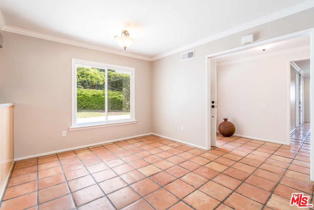 6267 Tapia Drive Malibu, CA 90265 - Photo 3 of 16 a view of an empty room and window